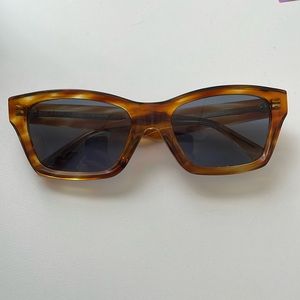 Céline tortoiseshell sunglasses, slight cat eye design.
